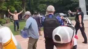 Mohamed Sabry Soliman being detained by police in front of the Boulder County Courthouse